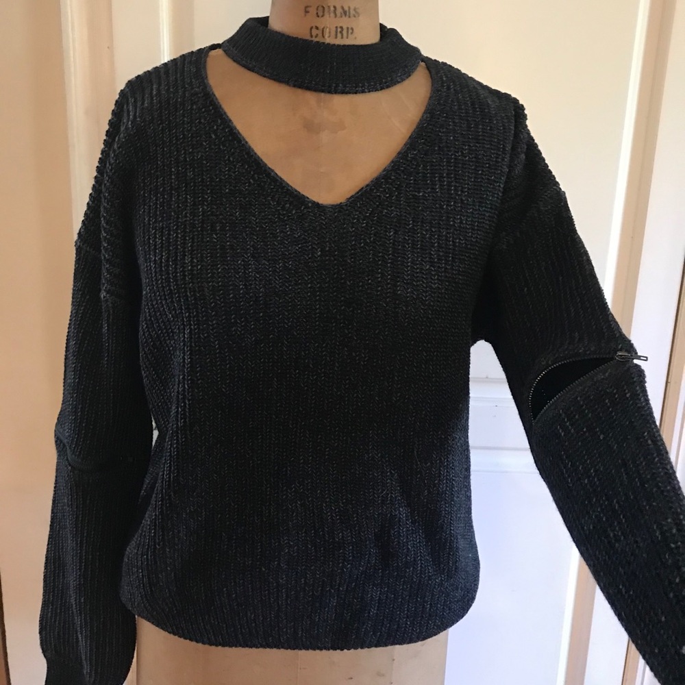 Charcoal grey sweater with zipper detail on sleeve